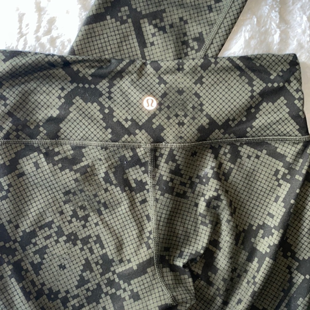Olive green snake skin crop Lululemon leggings